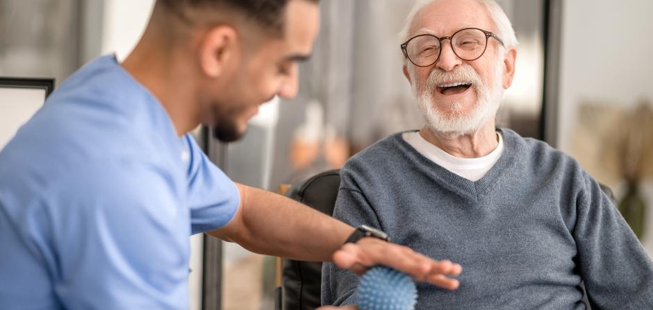Man Smiling at a Doctor