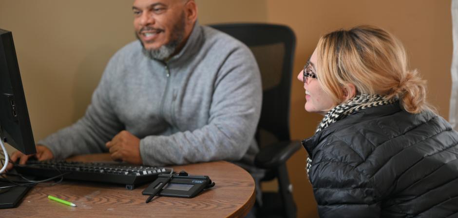 case manager and patient in an employment meeting