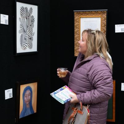 woman looking at art