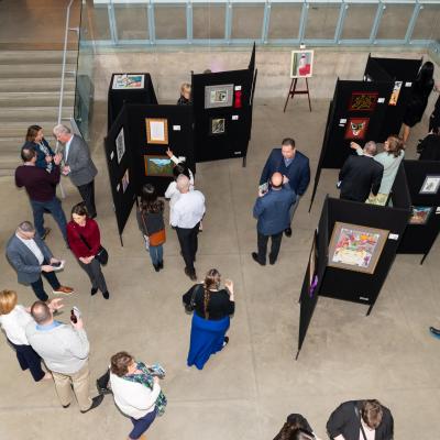 overhead of people viewing art