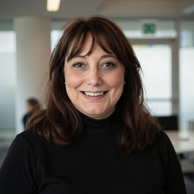 Photo of Laura Villwock in a black turtleneck.